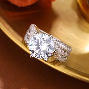 Macro view of luxury 5-carat round cut faux diamond ring with pavé band detail
