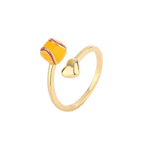 Sporty gold adjustable ring with yellow enamel softball and heart design for women
