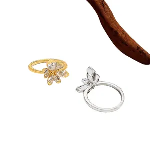 Elegant sparkling zircon flower ear hoops in gold and silver finish for daily fashion jewelry