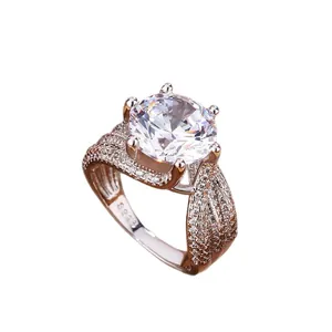 Sparkling 5-carat crown solitaire ring with a six-prong setting and pave-set band