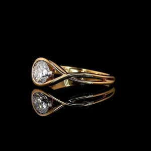 Elegant minimalist gold-plated geometric ring for women featuring a brilliant round moissanite stone
