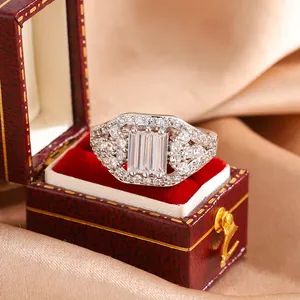 Close-up of luxurious baguette-cut zircon ring with pavé setting.