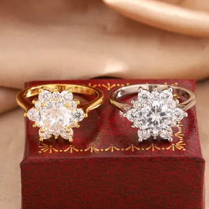 Detailed view of elegant sunflower diamond rings in gold and silver finishes