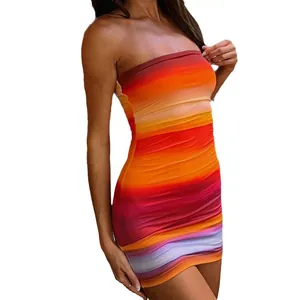 Close-up of vibrant rainbow gradient print on sexy ruched tube bodycon mini dress