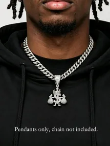 Detailed view of an iced out dollar sign and money bag pendant on a street style model