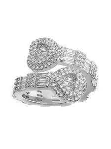 Detailed view of hip-hop heart ring with brilliant baguette and pave clear stones
