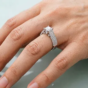 Detailed macro view of an elegant copper plated white gold ring with sparkling zirconia stones