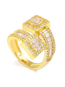 Detailed view of luxury gold-plated square open ring with sparkling cubic zirconia