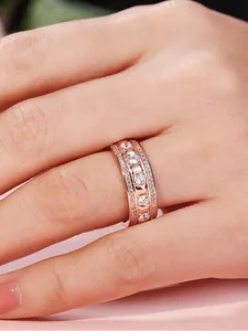 Close-up detail of luxurious 18K rose gold plated ring with cubic zirconia stones