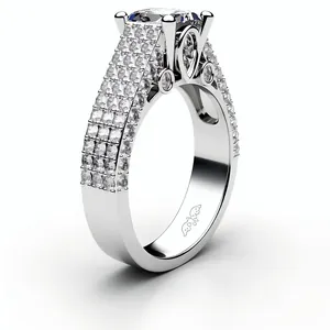 Close-up detail of silver-plated engagement ring with pavé set cubic zirconia stones