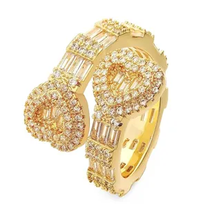 Exquisite iced out heart wrap ring in gold finish with baguette and round stones