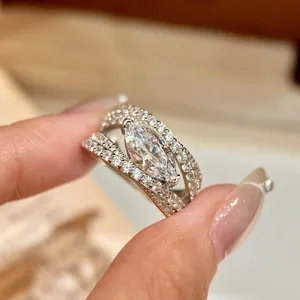 Close-up of a silver-colored micro-pave marquise cut zircon open ring for women
