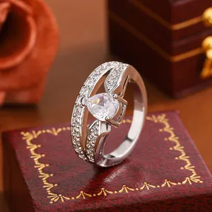 Elegant pear-shaped cubic zirconia ring with double pavé-set bands detail