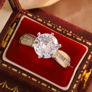 Close-up of sparkling six-prong moissanite ring in a vintage red velvet jewelry box