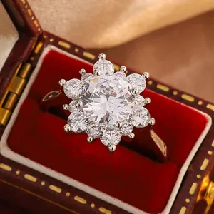 Detailed macro shot of a sparkling snowflake rose gold ring with brilliant round zircons.