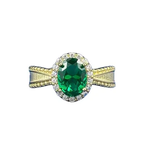 Elegant oval simulated emerald open ring with halo diamonds in vintage design for women