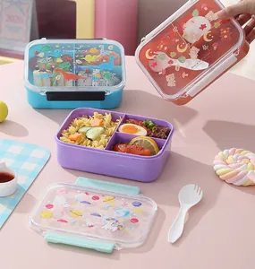 Detail view of colorful three-compartment plastic cartoon lunch boxes for kids and students