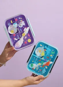 Detailed macro view of two colorful 3-compartment cartoon lunch boxes for children
