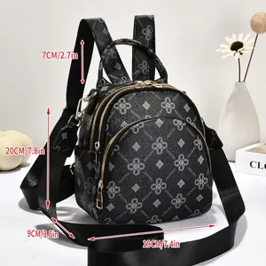 Piccolo zaino nero con stampa floreale da donna dimensioni 20x19x9 cm dettagliata