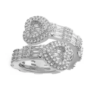 Elegant silver bypass ring featuring dual pavé heart motifs and baguette stones for women