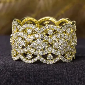 Elegant gold-plated floral lace ring with sparkling cubic zirconia pavé stones.