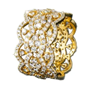 Elegant ornate gold hollow floral lace band ring with sparkling cubic zirconia pavé