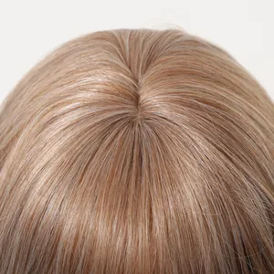 Macro view showing the realistic scalp part and rose gold synthetic hair texture