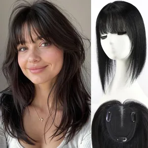 Close-up detail of human hair topper with Swiss net base and natural front bangs