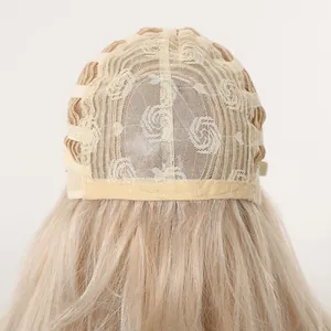 Detail view of the breathable rose net cap structure for the long wavy rose gold wig.