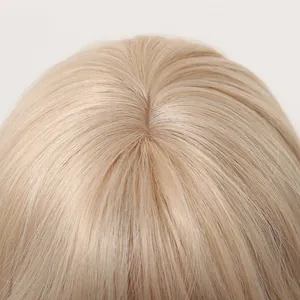 Detailed top view of a realistic blonde wig scalp made from matte high temperature silk