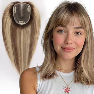Close-up detail of blonde balayage human hair topper with breathable Swiss lace base