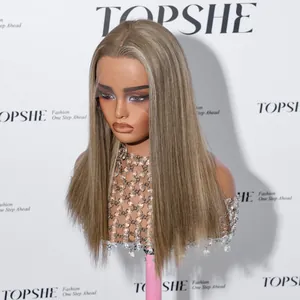 Detail view of ash blonde straight human hair wig with Swiss lace hand-tied base.
