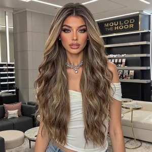 Detailed view of long wavy gradient blonde lace front wig on a professional model
