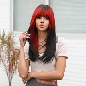 Detail view of medium-long red and black ombré wig with straight bangs and curled ends