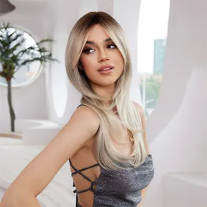Detailed view of long ombre blonde wig with layered cut and natural waves on model