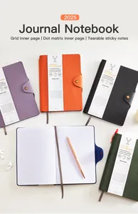 Collection of multi-colored A5 leather journals with buckle closure and grid paper.