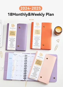 Detailed view of A5 18-month PU planner with spiral binding and colorful covers
