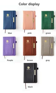Detailed view showing seven different color options of the 18-month faux leather planner.