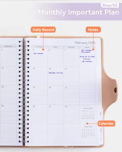 Detailed view of A5 PU leather spiral planner showing February 2026 monthly layout with notes section.