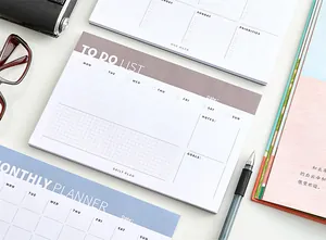 Close-up of a minimalist daily to-do list planner with organized sections and grid layout.