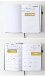 Detailed interior view of 18-month English planner showing calendar and personal data pages