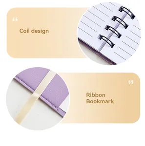 Macro detail of purple PU leather notebook with coil binding and ribbon bookmark
