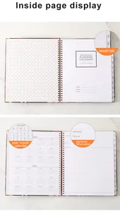 Interior view of 2023 weekly monthly planner showing calendar pages and month tabs