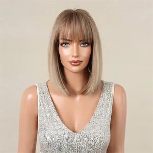 Detailed view of women's short straight wig with bangs, brown and gold ombre hair