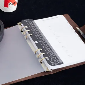 Vintage top-grain leather loose-leaf planner notebook with ruler and English calendar pages