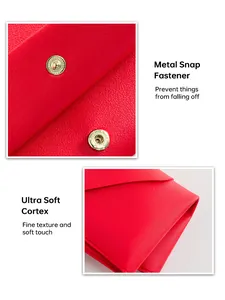 Detalle de este sobre rojo de PU con cierre de metal y textura de corteza suave.