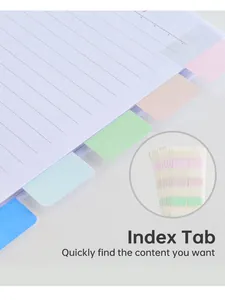 Primer plano detallado que muestra pestañas de índice adhesivas de colores en un cuaderno