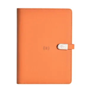 Exklusives oranges Notizbuch mit kabellosem Laden und integrierter Powerbank-Funktion