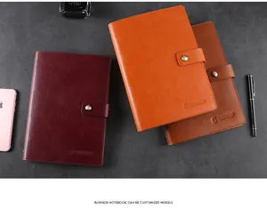 Business faux leather loose-leaf notebooks in maroon, orange, and brown colors