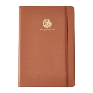 Premium A5 bruin echt lederen notitieboek met een gouden leeuwenlogo en elastische band